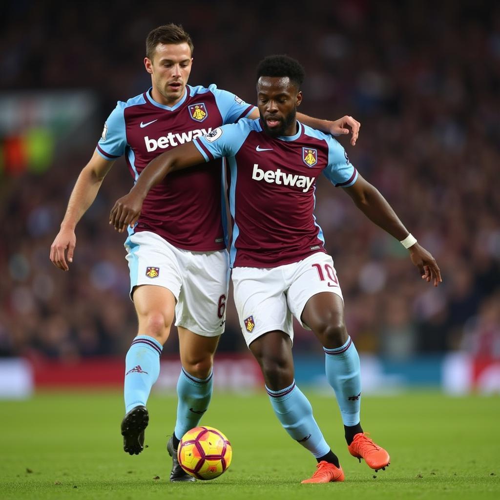 Trung vệ Burnley James Tarkowski theo sát Michail Antonio